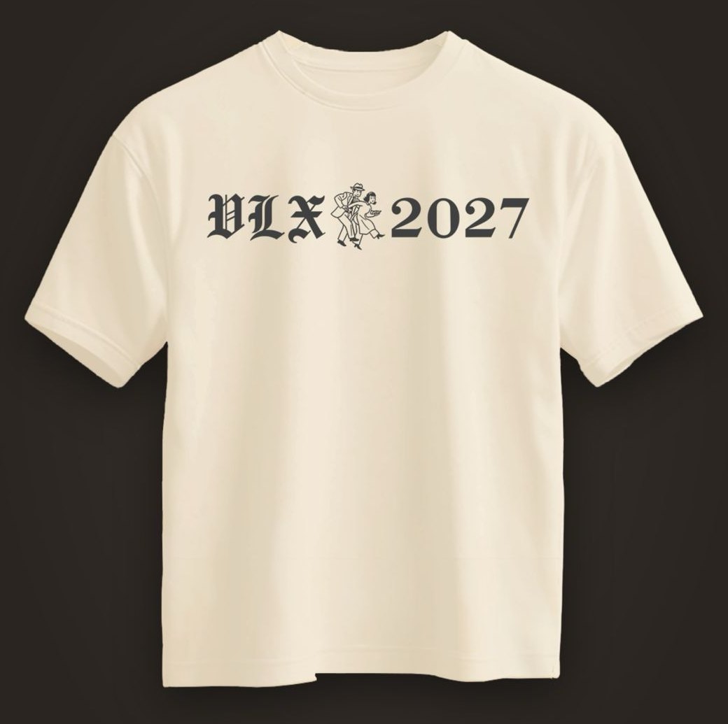 VLX 2027 T-shirt, front — cream tee with the VLX 2027 logo and a dancing couple